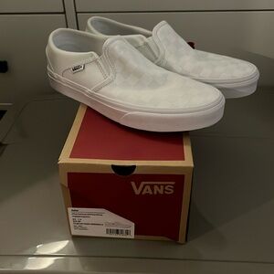 NWT Checkerboard White on White Vans slip on sneakers.